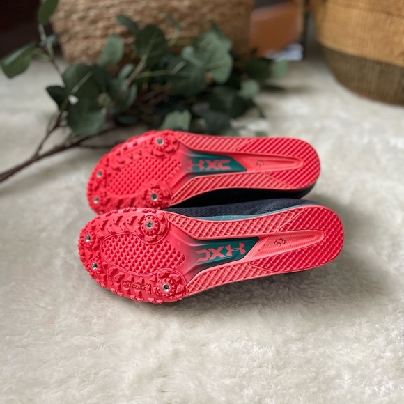 Under Armour Black and Red Athletic Shoes
Unisex Cross Country Shoes - Picture 8 of 10